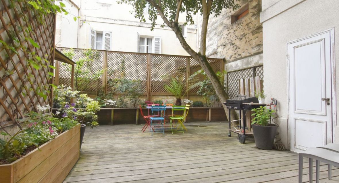 superbe appartement de 240m2 et son jardin sur le Jardin Public